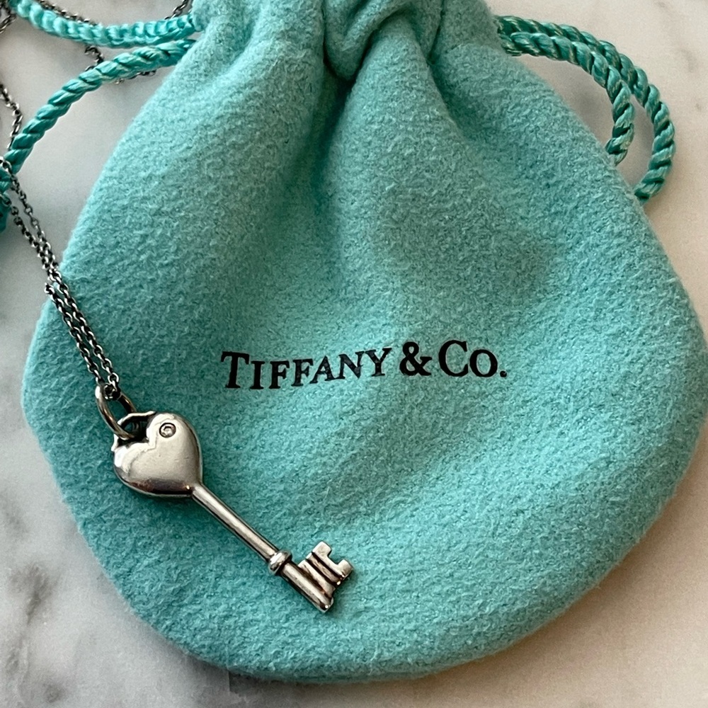 Tiffany & Co Silver Key Pendant with tiny Diamond (retired design)